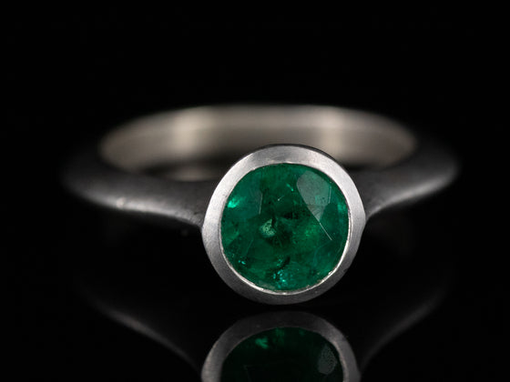 Emerald Solitaire Ring in 18K White Gold