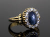 The Helena Midnight Blue Star Sapphire and Diamond Halo Ring in 18K Yellow Gold