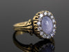 The Helena Misty Gray Star Sapphire and Diamond Halo Ring in 18K Yellow Gold